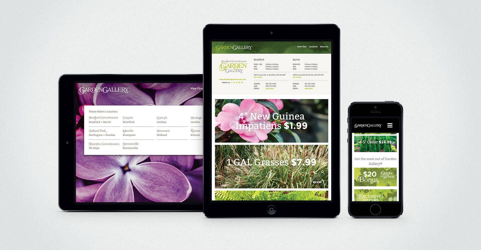 A tablet , a phone , and a tablet with a purple flower on the screen.