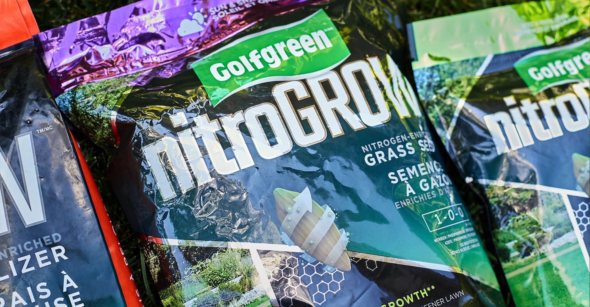 Three bags of nitrogrow are sitting on top of each other on a table.