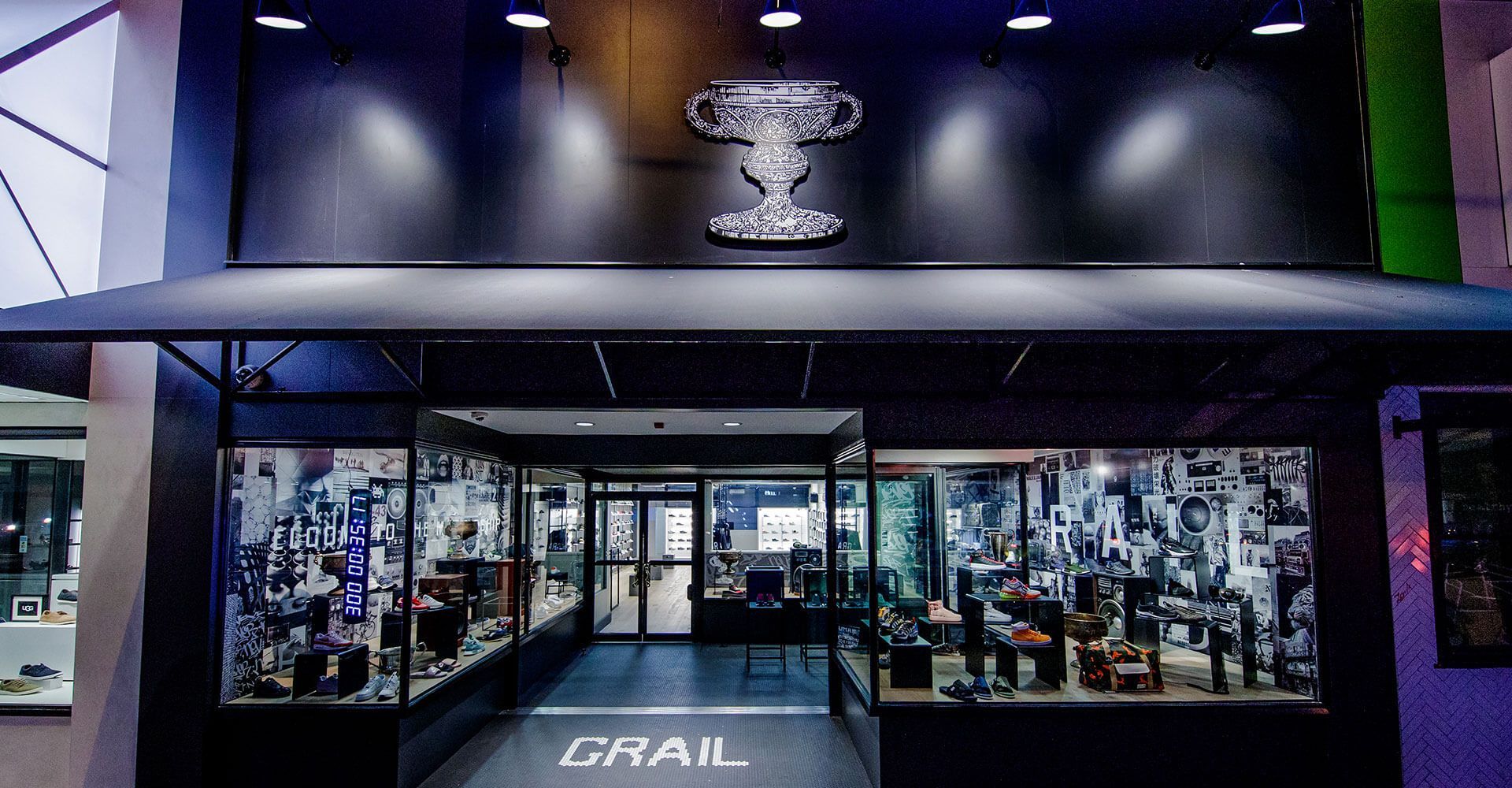 A store front with a sign that says trail on it