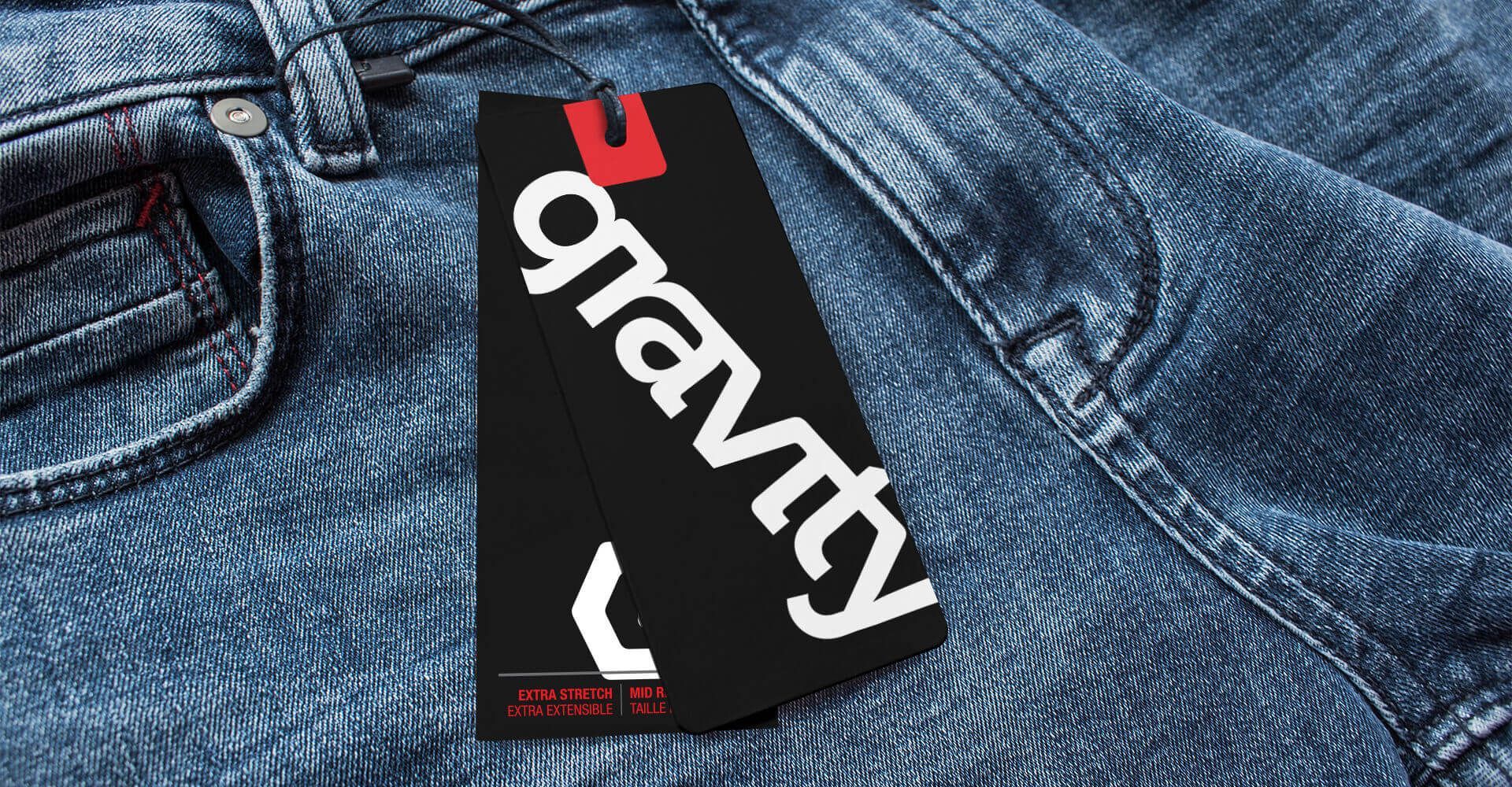 A pair of jeans with a tag that says gravity on it