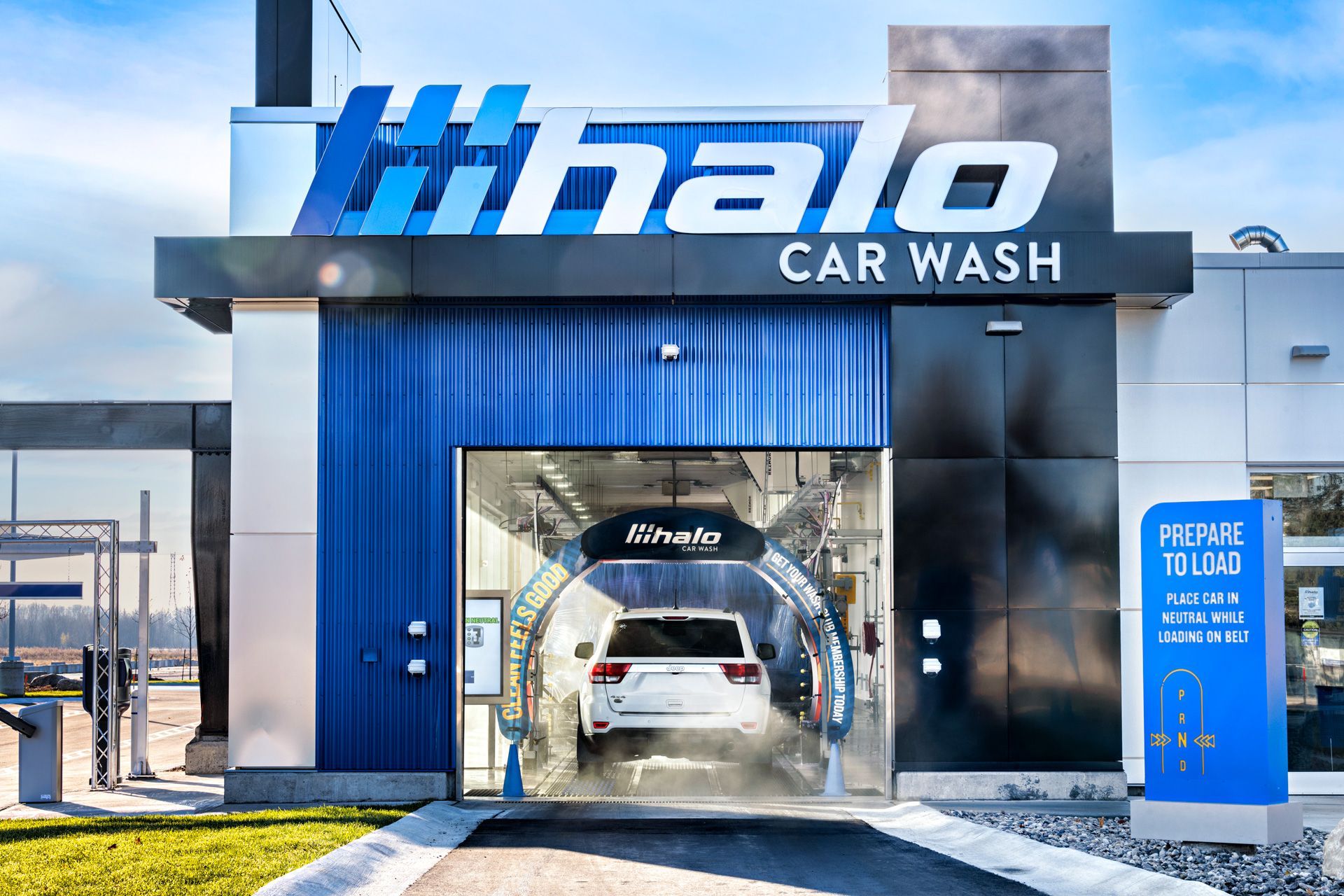 A car is going through a car wash at a car wash.