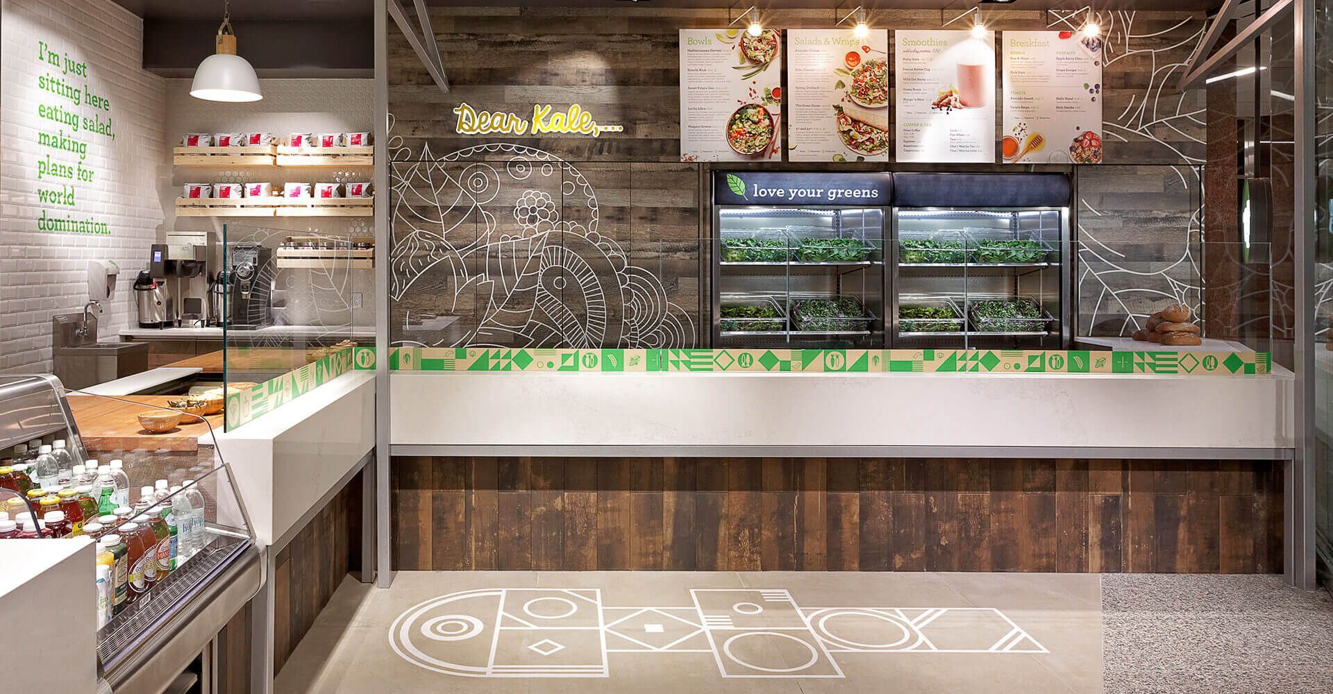 A rendering of a restaurant with a wooden counter and a display case.