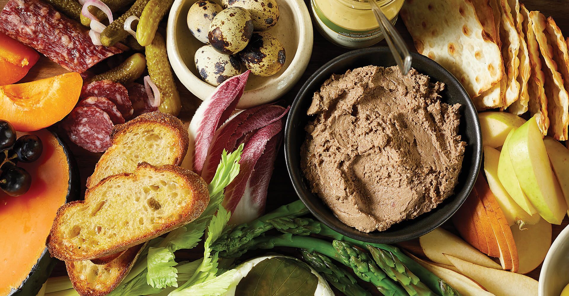 There are many different types of food on the table.
