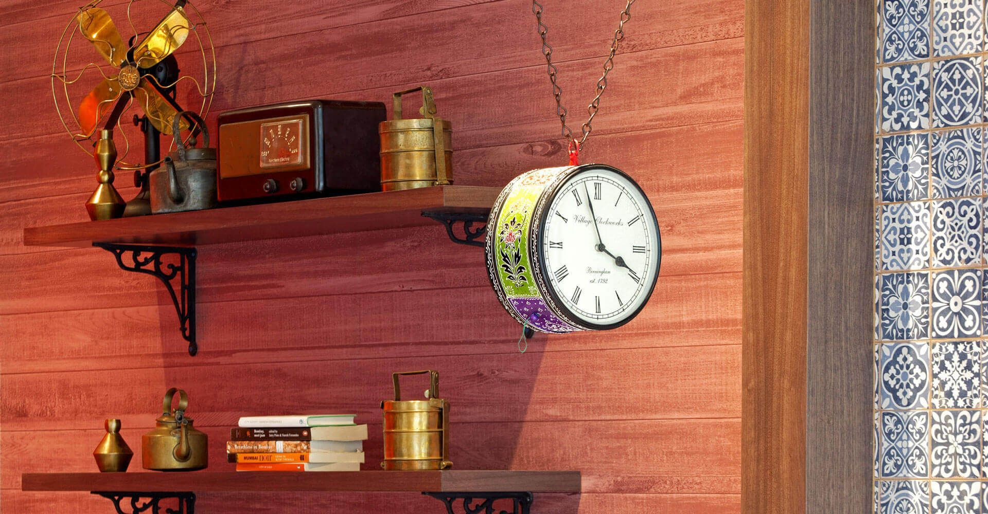 A wooden shelf with a clock hanging from it