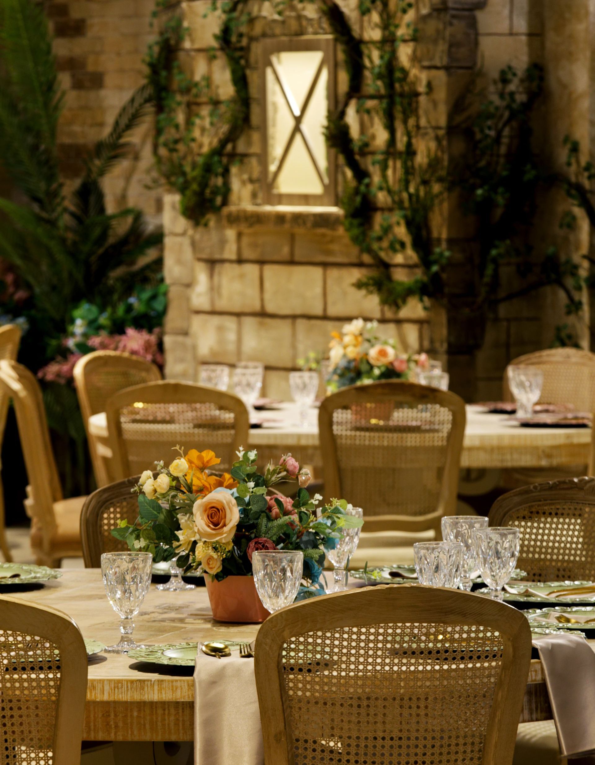 A table with a vase of flowers on it
