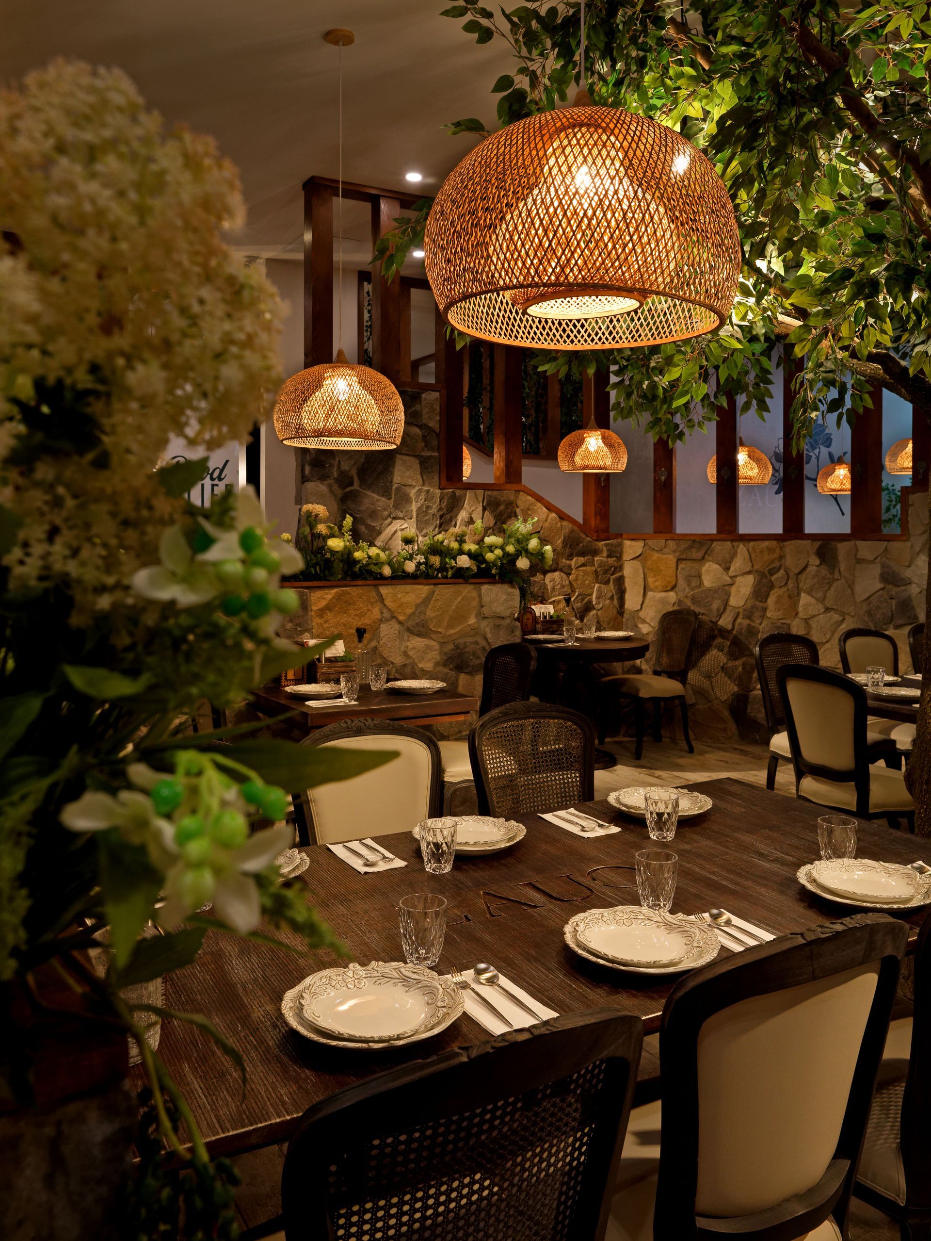 A restaurant with a lot of tables and chairs