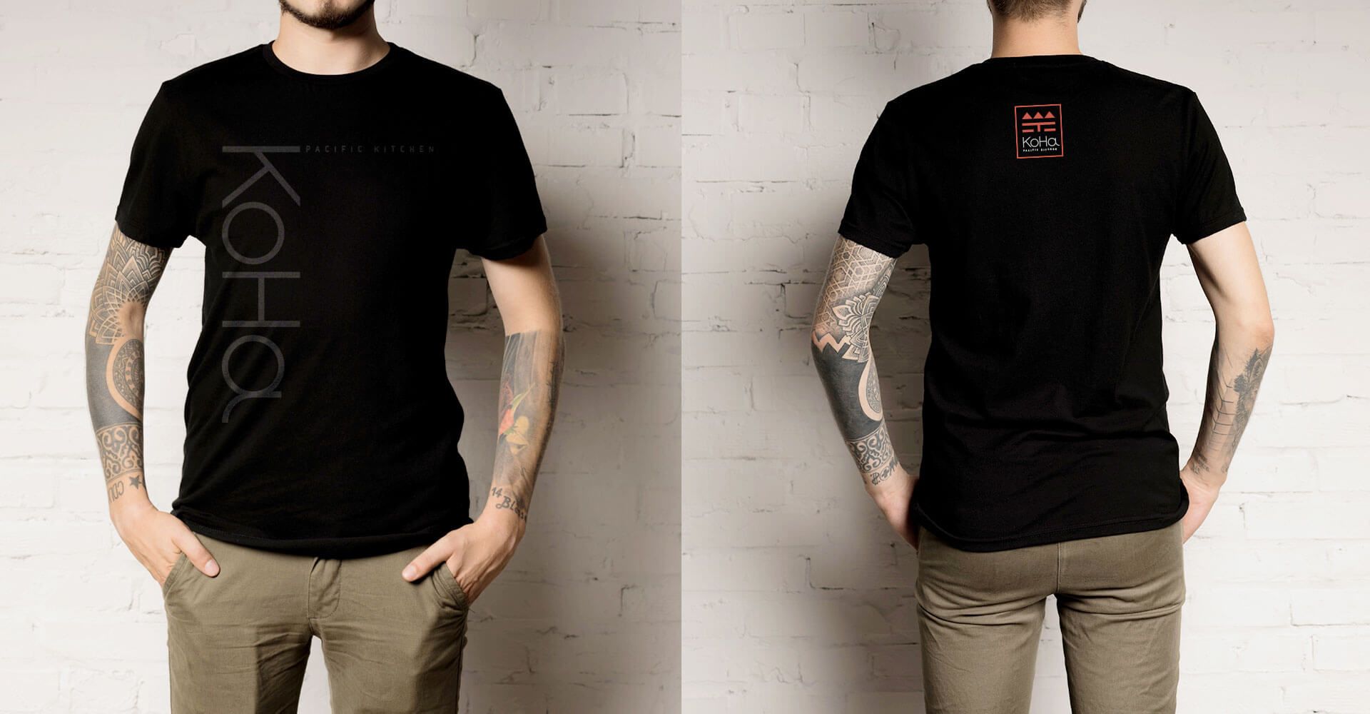 A man is wearing a black t-shirt with the word koha on it.
