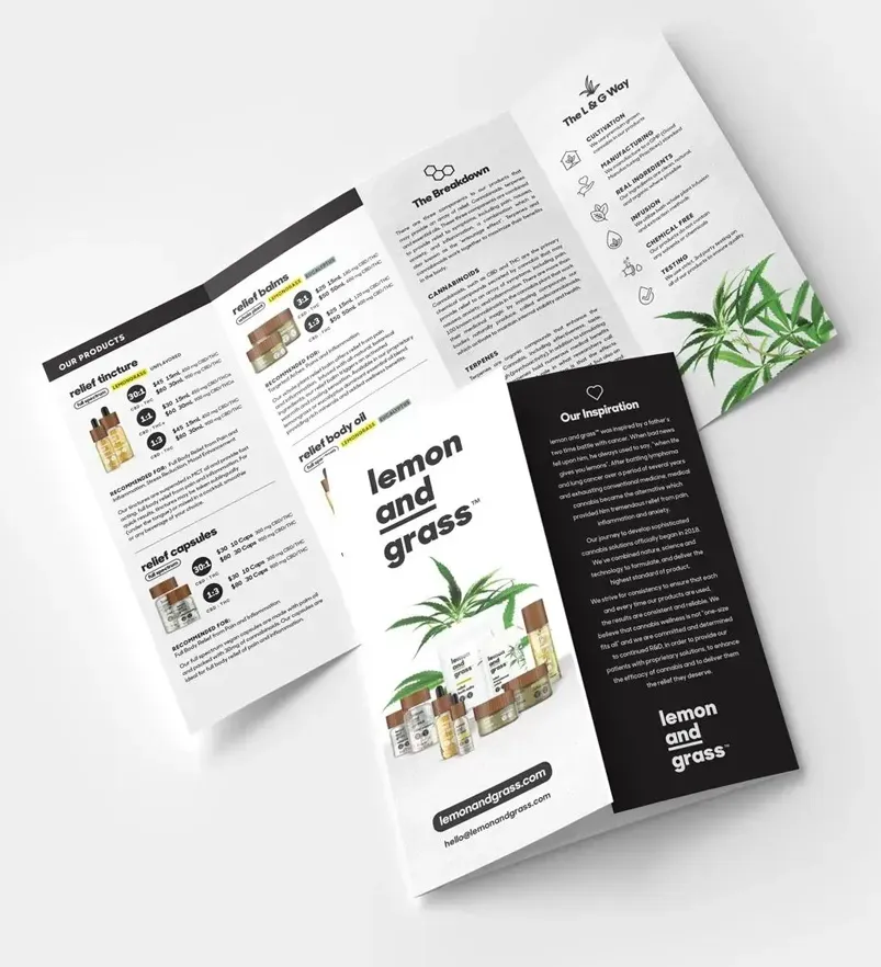 A brochure for lemon and grass is sitting on a table.