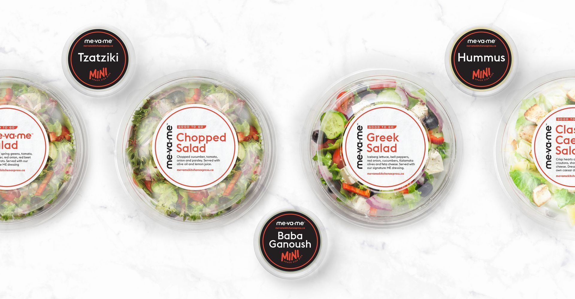 A variety of salads in plastic containers on a table.