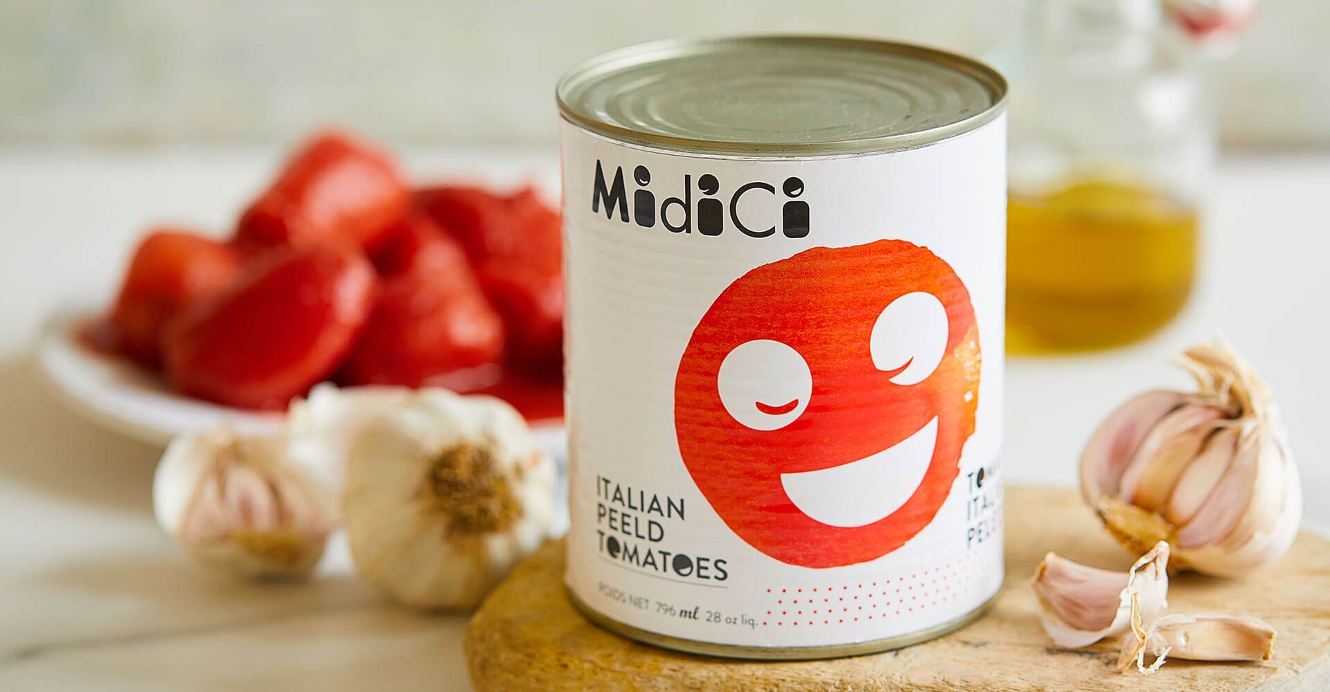 A can of tomatoes with a smiling face on it