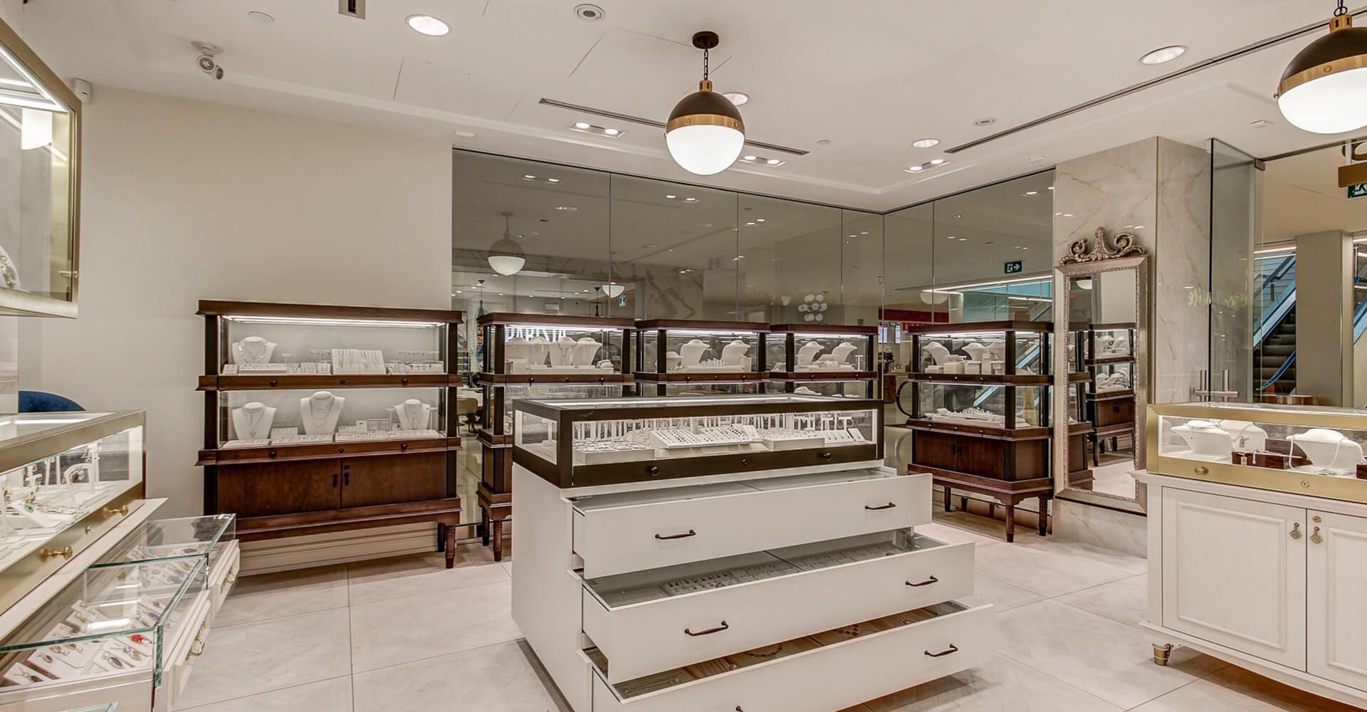 A jewelry store with lots of drawers and shelves.