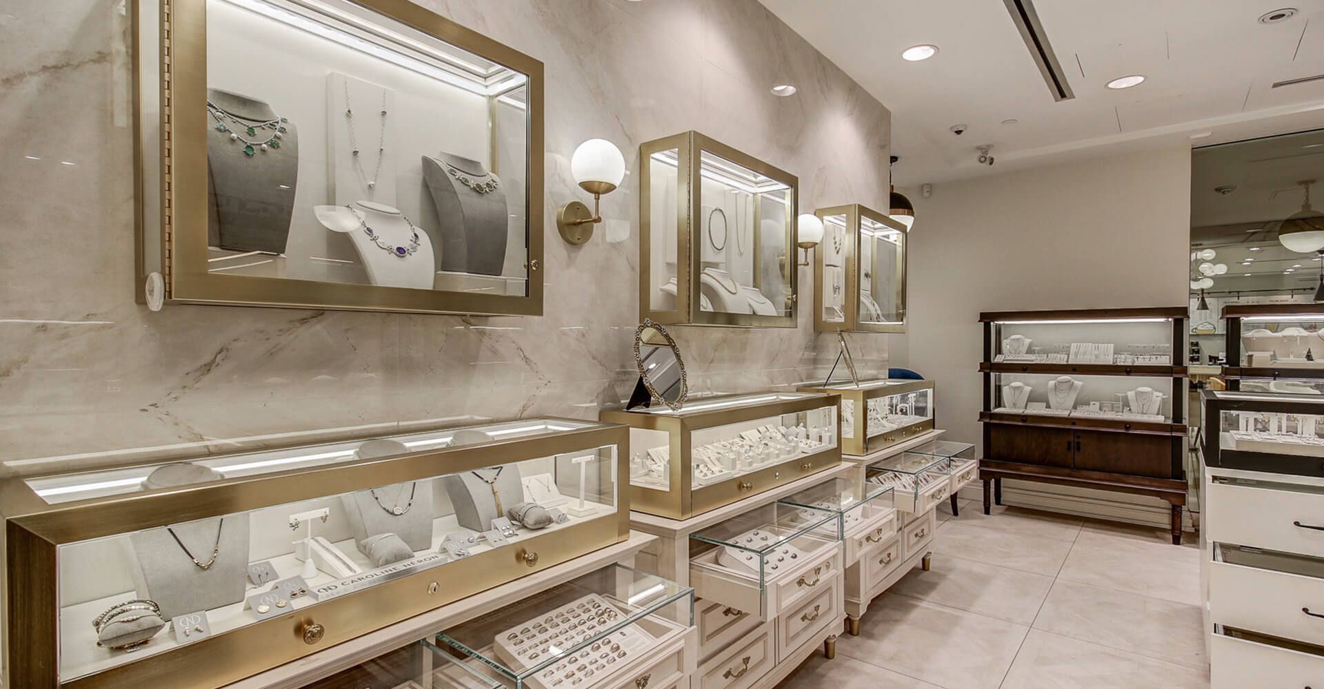 A jewelry store filled with lots of jewelry on display.
