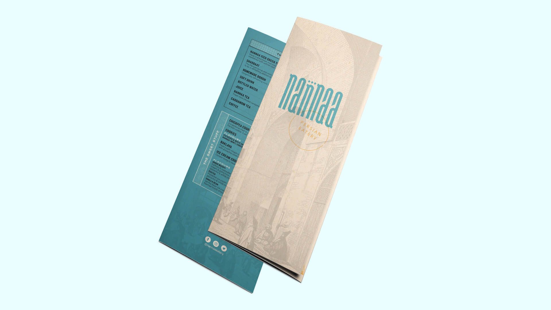 Two menus are sitting on top of each other on a white surface.