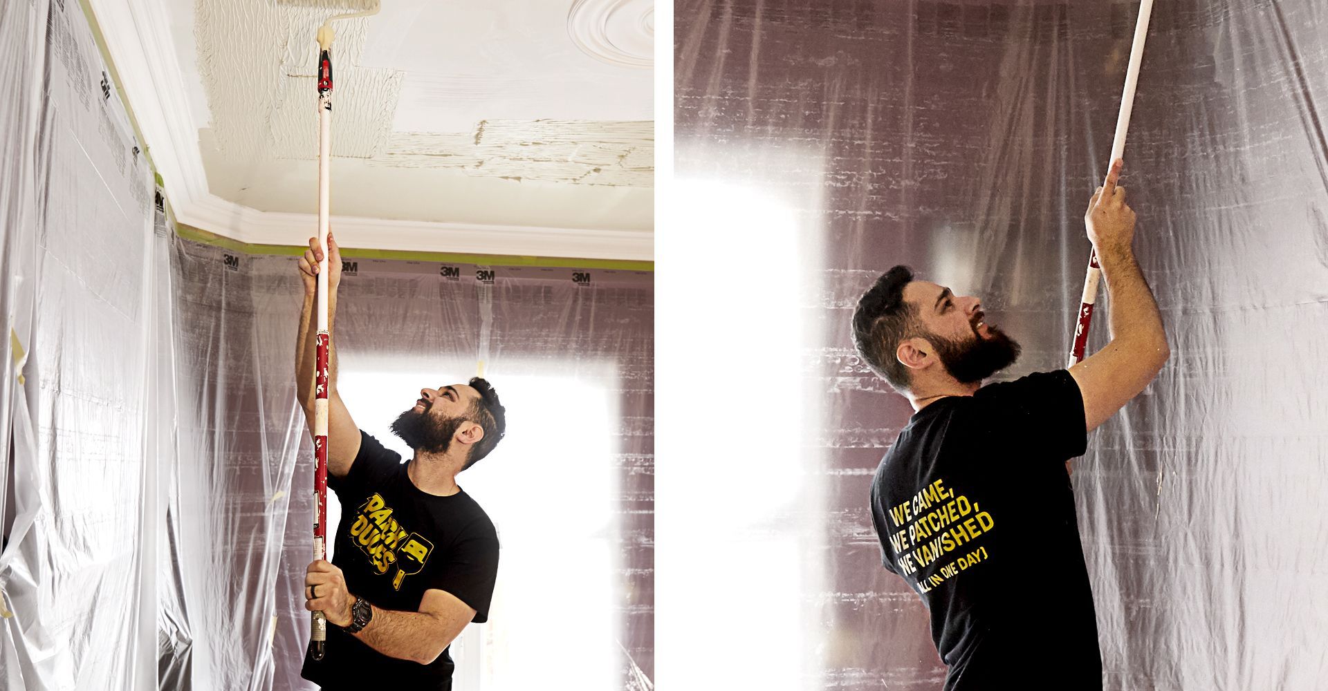 A man is painting the ceiling of a room with a paint roller.