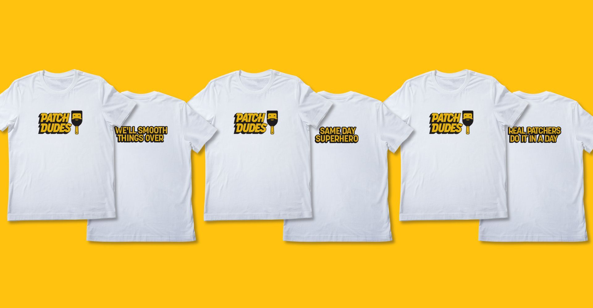 A row of white t-shirts with yellow letters on them on a yellow background.