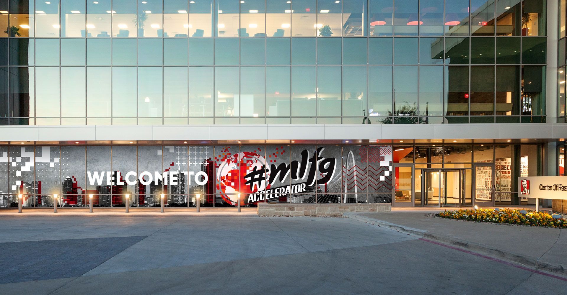 A large building with a welcome sign on the front of it.