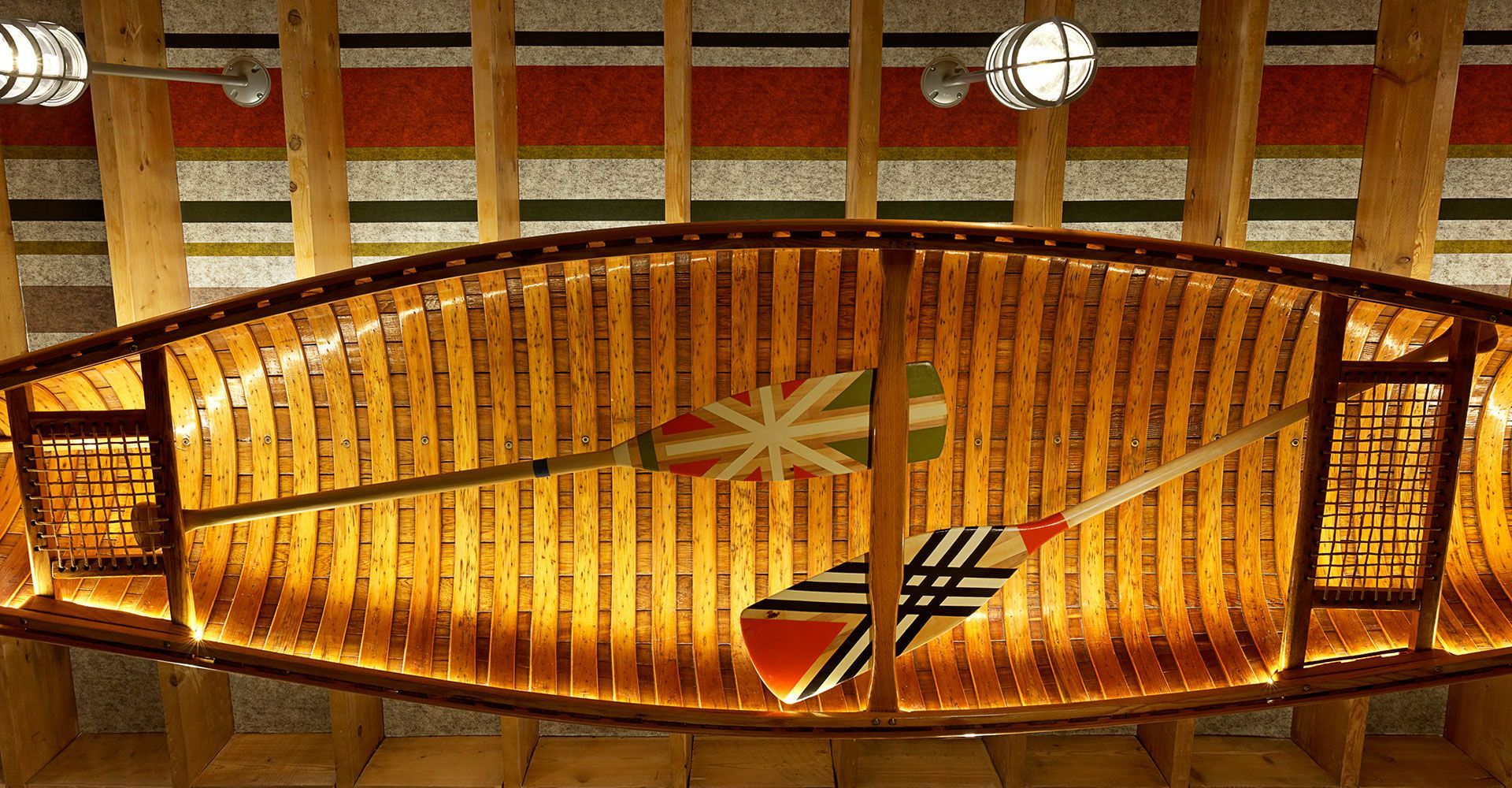 A wooden canoe with a canadian flag on it
