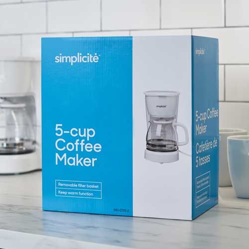 A blue and white box for a 5 cup coffee maker