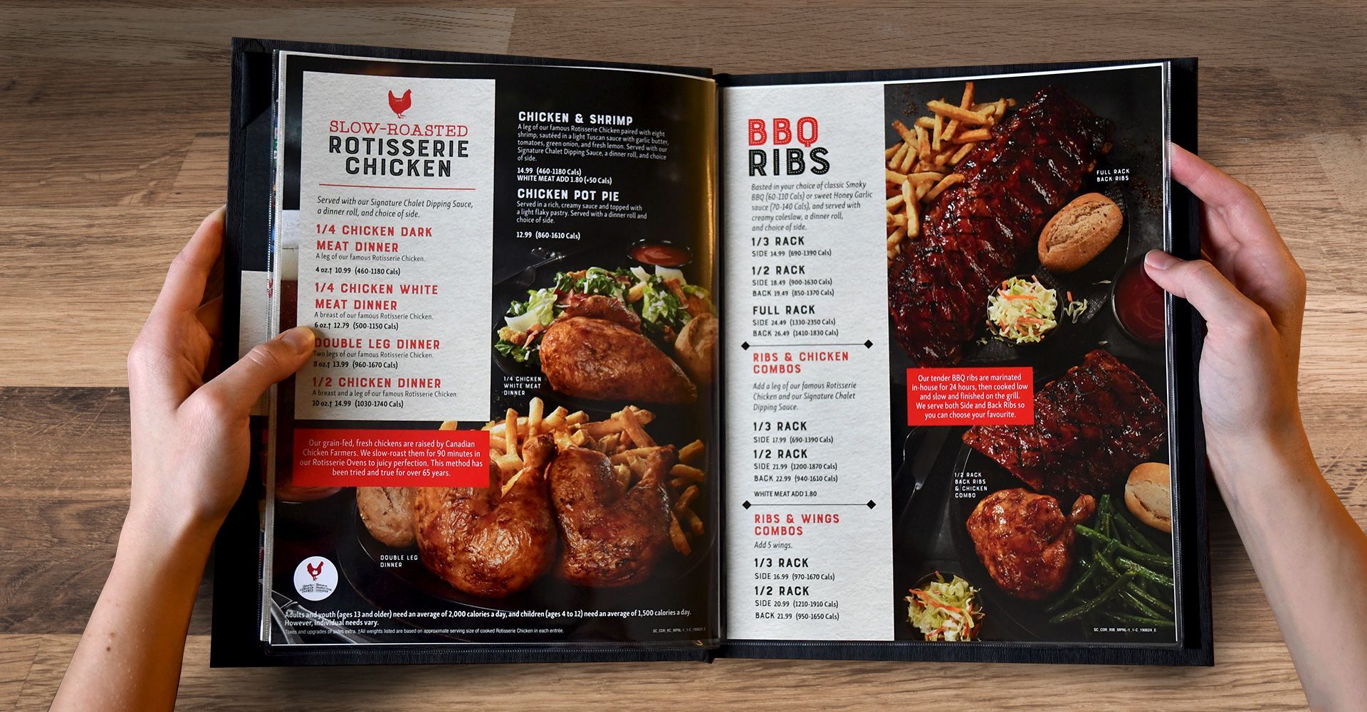 A person is holding a menu with pictures of food on it.