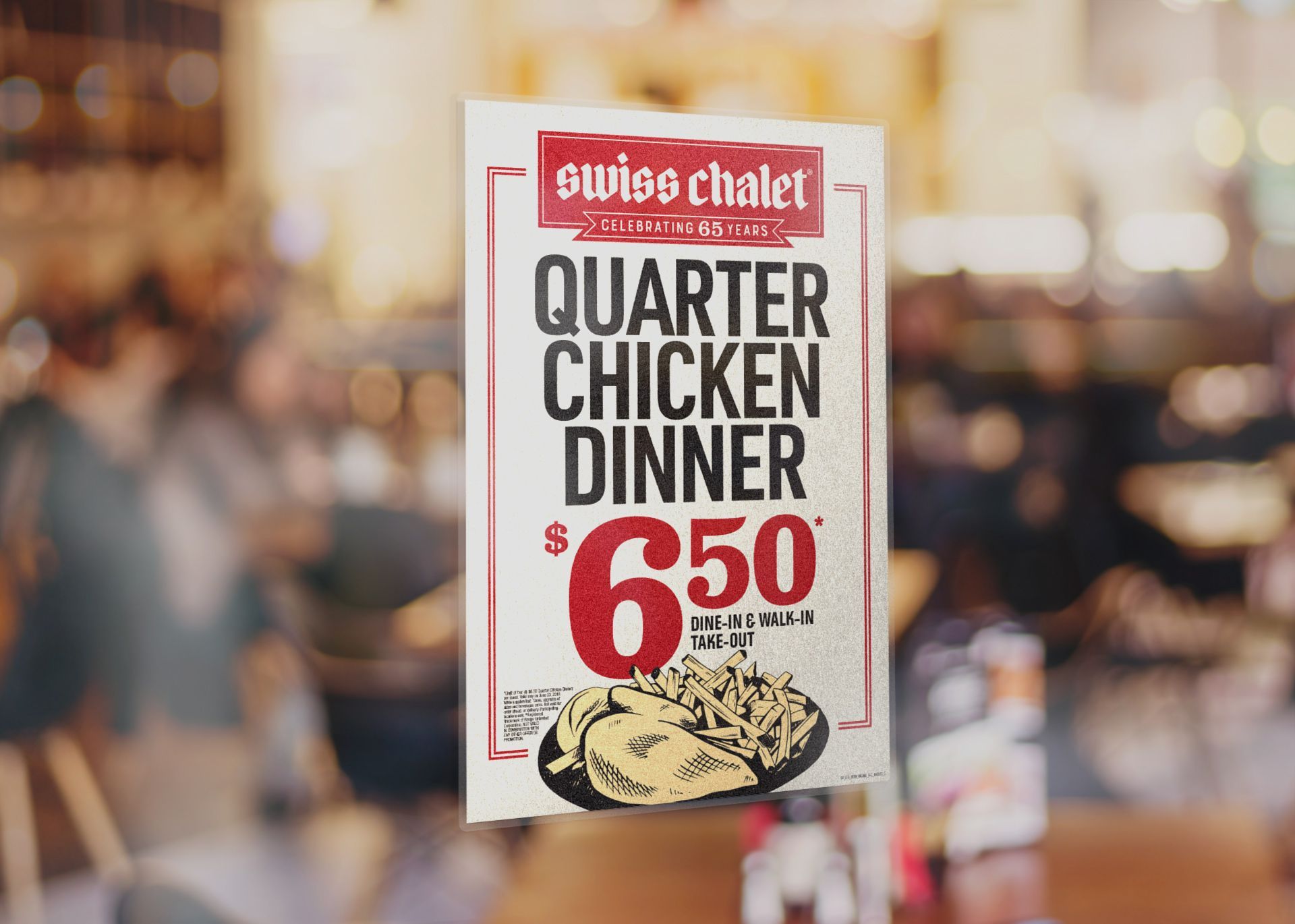 A sign for a quarter chicken dinner is hanging on a window.