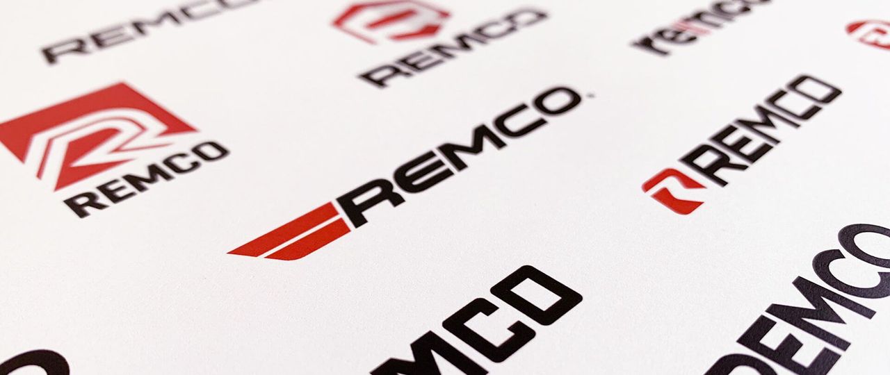 A close up of remco logos on a piece of paper.