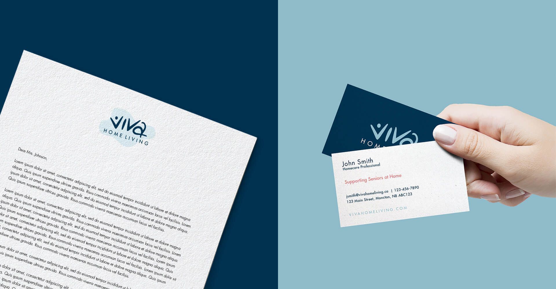 A person is holding a business card next to a letterhead.