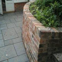 brick wall fencing of a garden