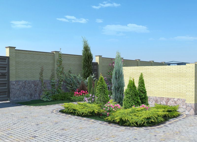 Landscaped yard with greenery, flowers, and trees