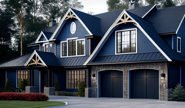 Blue house with stone garage, white trim, and dark roof in a wooded setting.