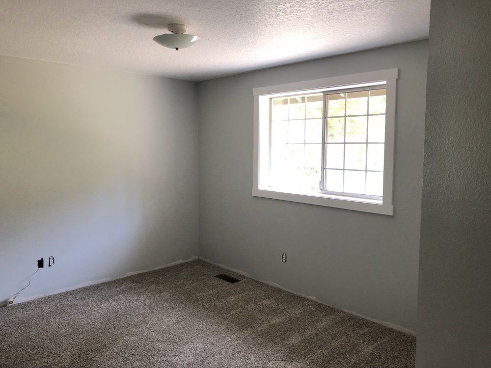 There is a large window in the middle of the room.