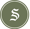A white Old English-style letter "S" centered inside a green circle with a thin white border.