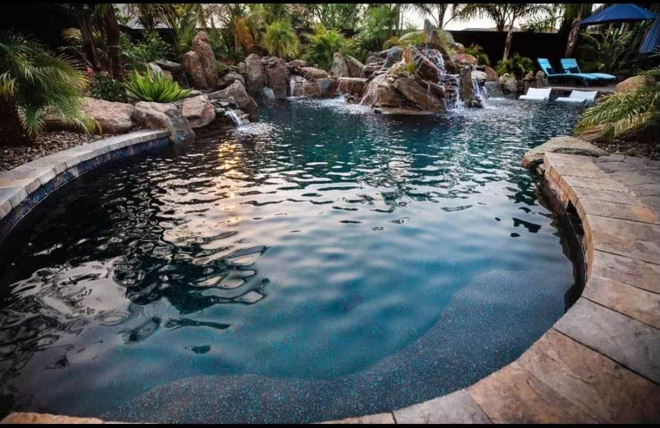 Beautiful living grotto pool design by Prestigious Pools in Placer County, CA