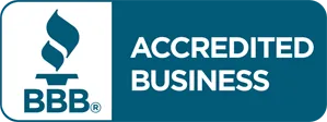 A blue sign that says accredited business on it
