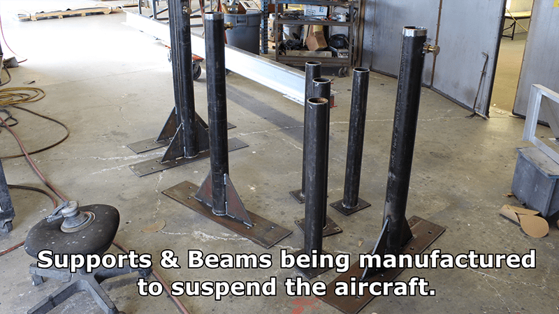 Supports and beams being manufactured to suspend the aircraft