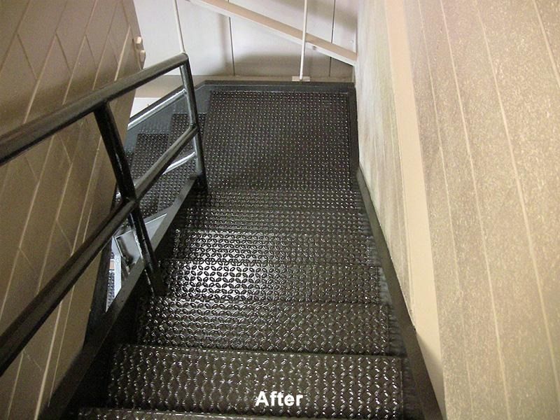 A picture of a staircase after being painted black