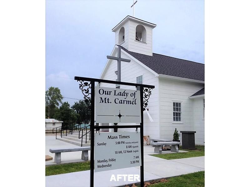 A church with a sign that says our lady of mt. carmel
