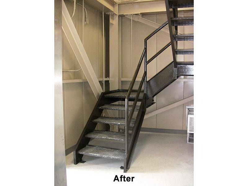 A picture of a staircase after being painted black