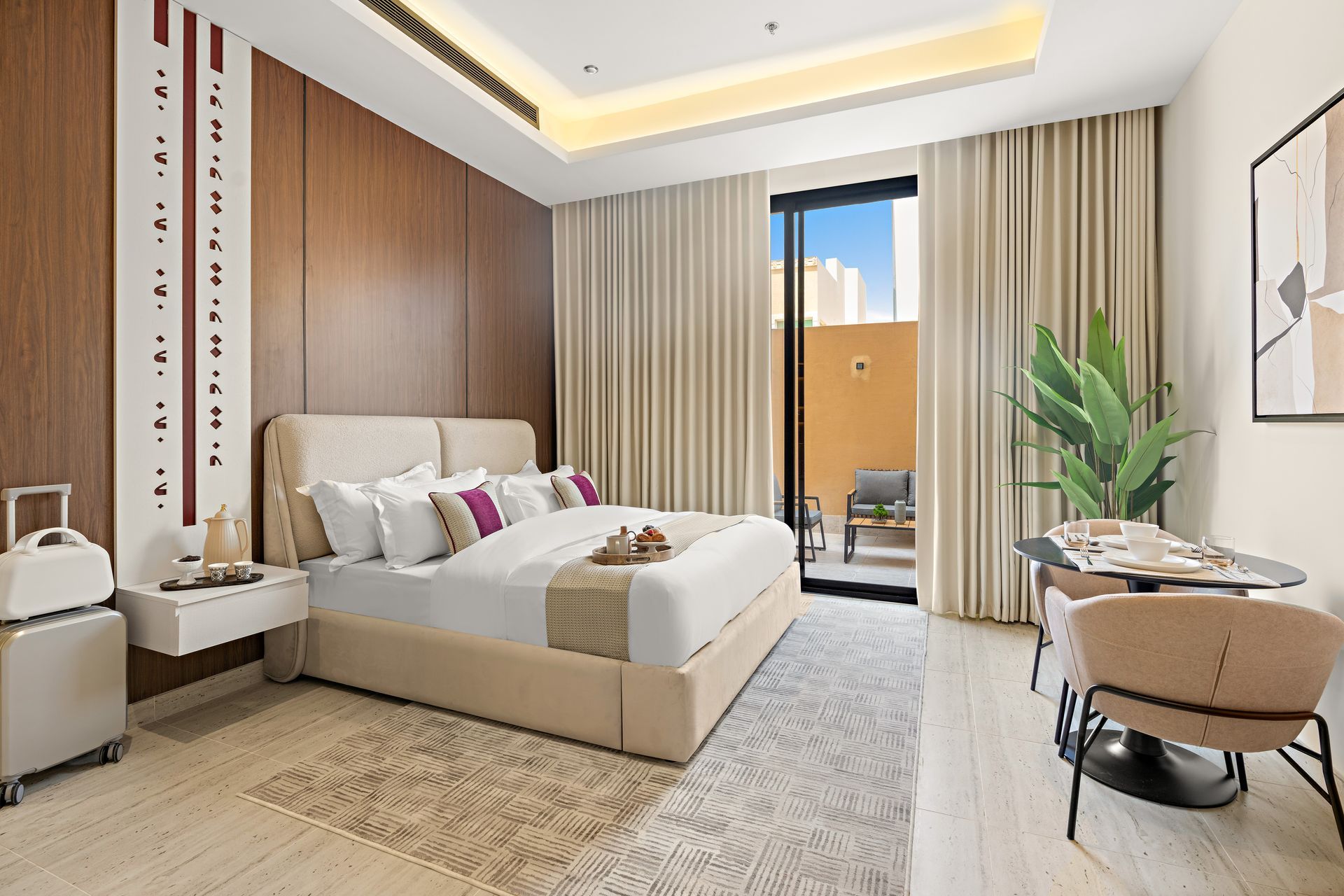 A bedroom with a large bed and a sliding glass door.