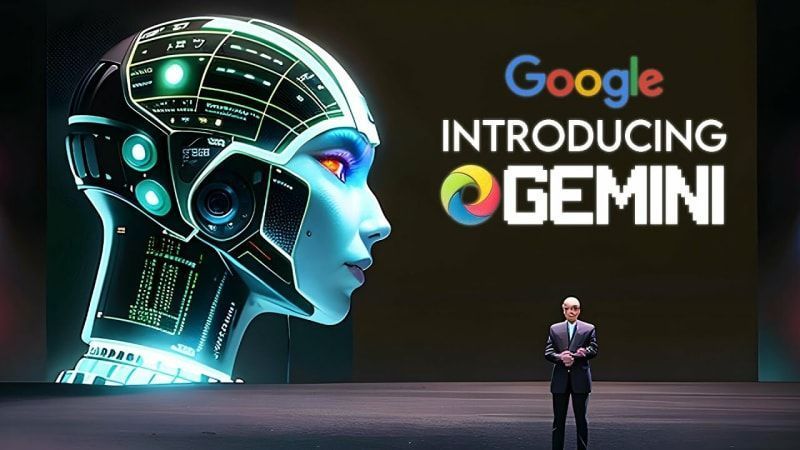 A man is standing in front of a screen that says google introducing gemini