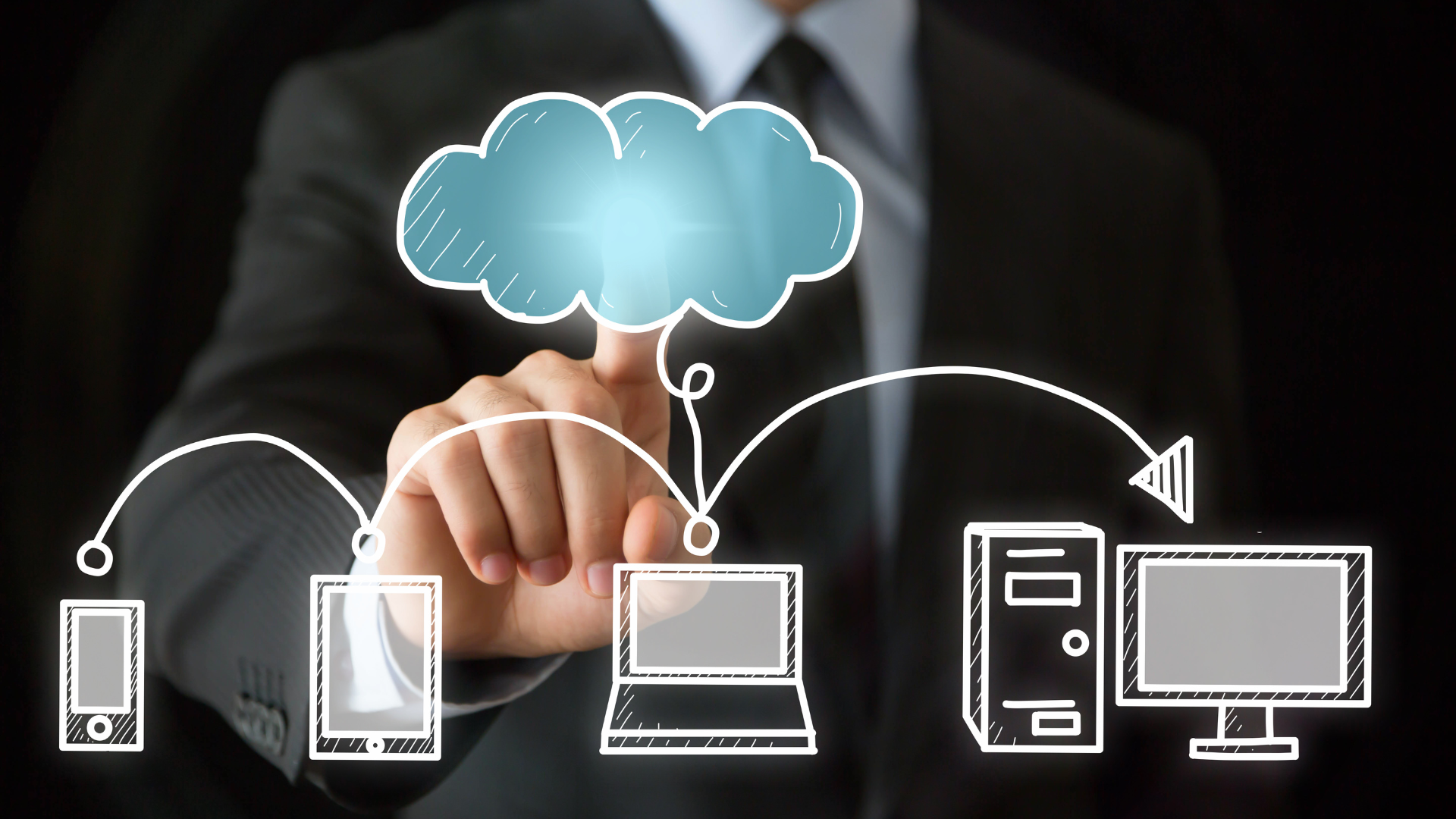 A business professional is pointing at a cloud surrounded by computer icons, symbolizing their choice to switch to a cloud-based phone system.