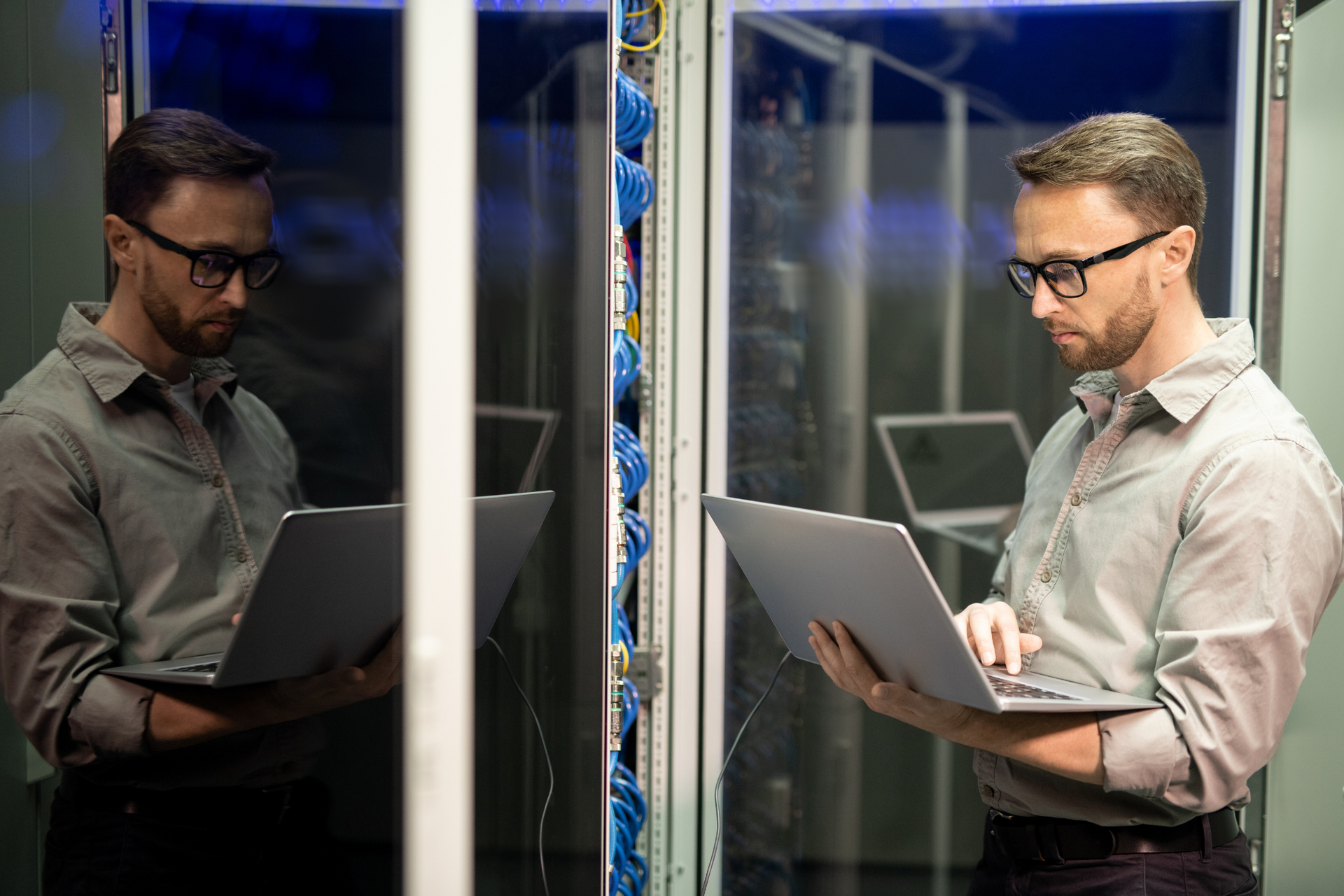 An ER Tech Pros representative performs maintenance checks to ensure their partner clinic’s data is protected from cybersecurity threats.