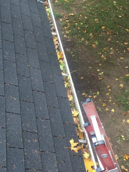 Gutter with full of leaves — Power Washing Services in New Galilee, PA