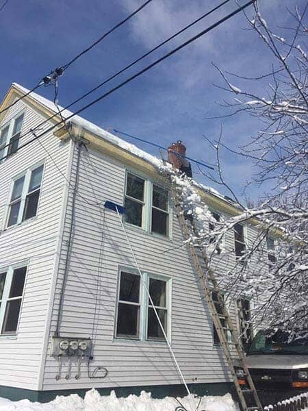 House with snow in roof — Power Washing Services in New Galilee, PA