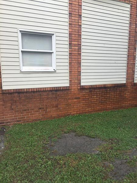 Wet brick wall — Power Washing Services in New Galilee, PA