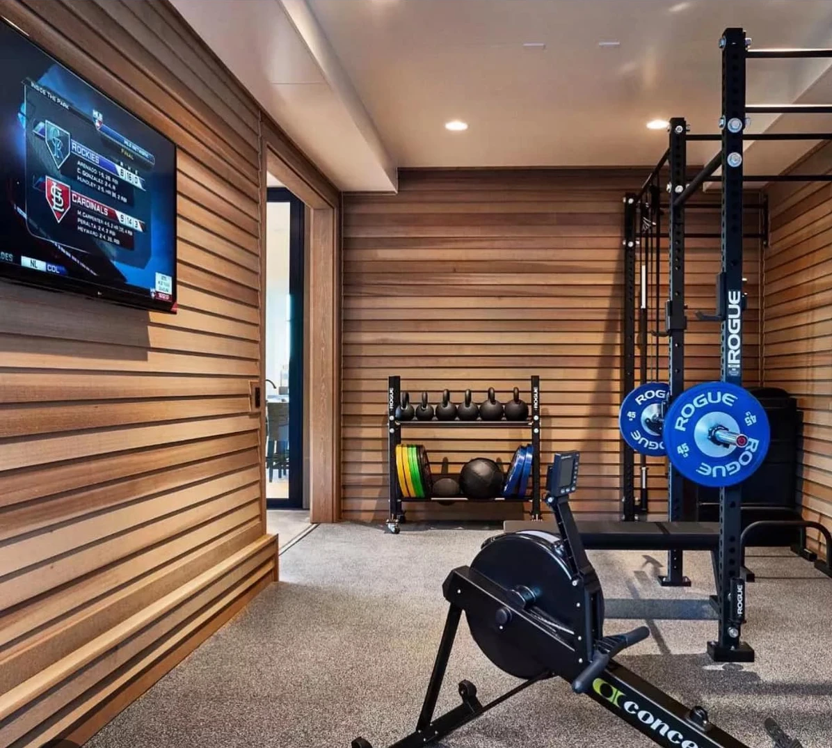 A rogue gym with a tv on the wall