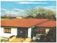 immagine di una casa in campagna