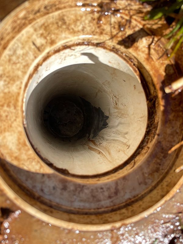 A Close Up Of A Drain With A Hole In It — BJB Plumbing & Gasfitting in Dubbo, NSW