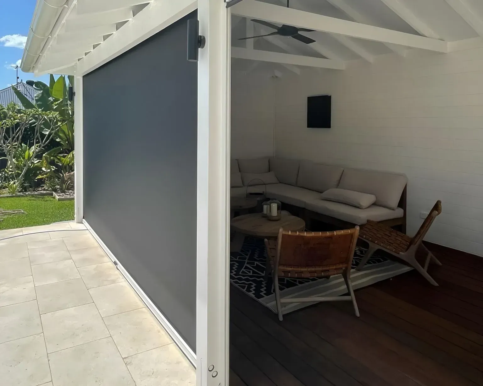 Outdoor patio with Ziptrak blinds installed