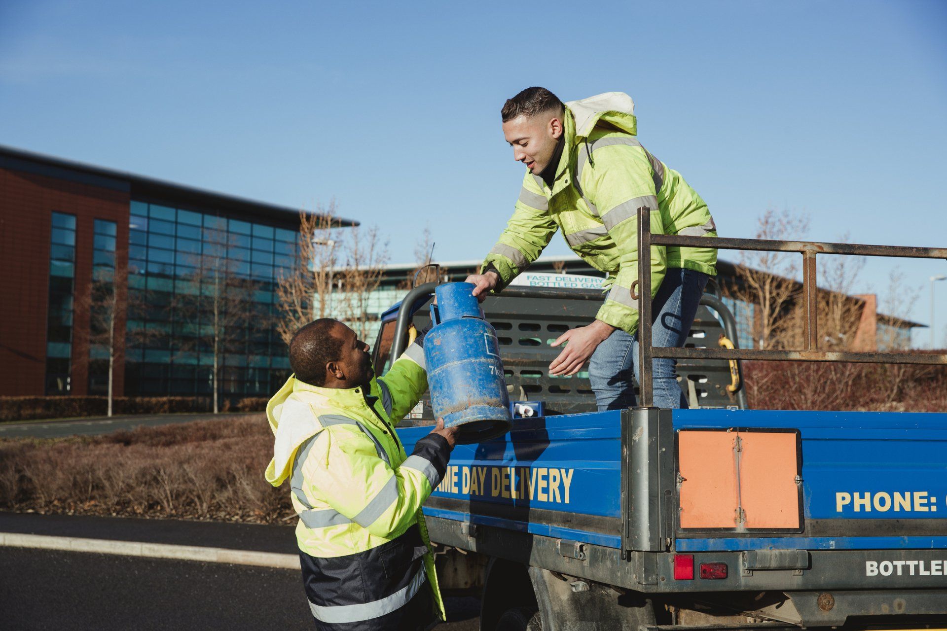 Two Men Working — Louisville, KY — AL Hansen Paint & Metal Shop Inc