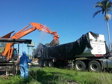 Asbestos Removal Using a Backhoe— Asbestos Removal in Currajong, QLD